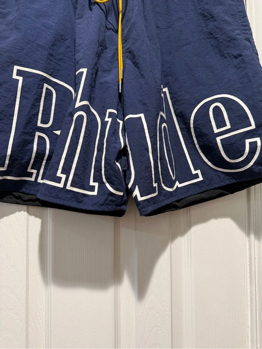Rhude Navy Logo Athletic Shorts with Yellow Drawcord